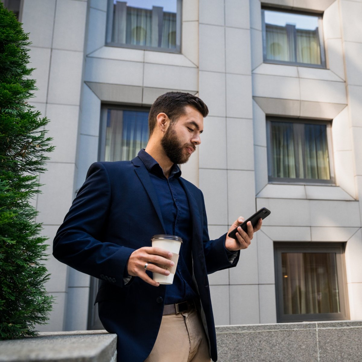 Man reading on his smart phone